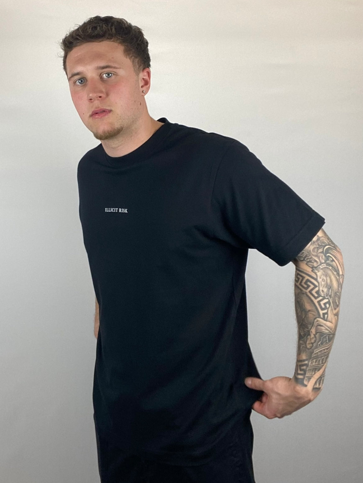 illicit risk black oversized T-shirt