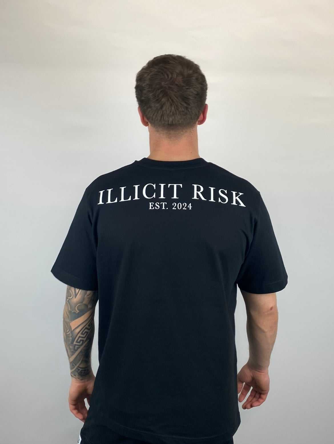 illicit risk black oversized T-shirt